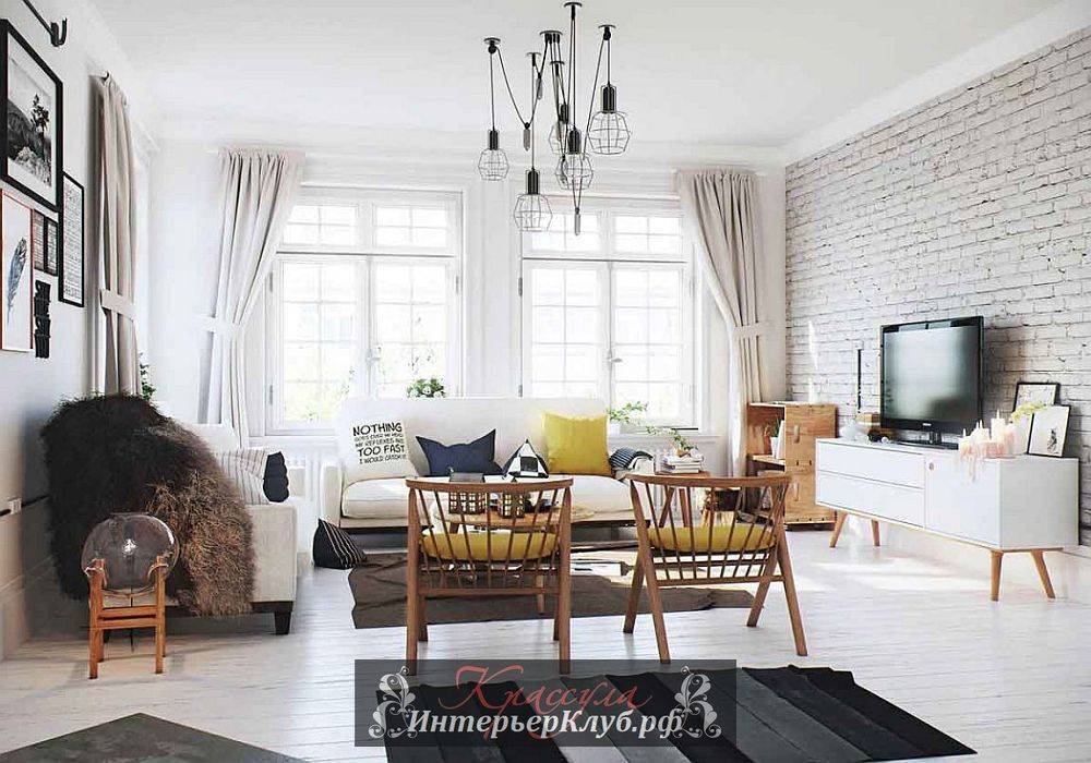 Большие окна, белая кирпичная стена в гостиной, индустриальный светильник и шикарная винтажная мебель