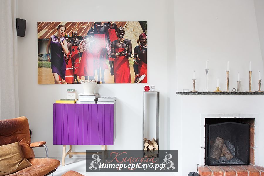 Минималистичный скандинавский декор украшает яркий пурпурный комод