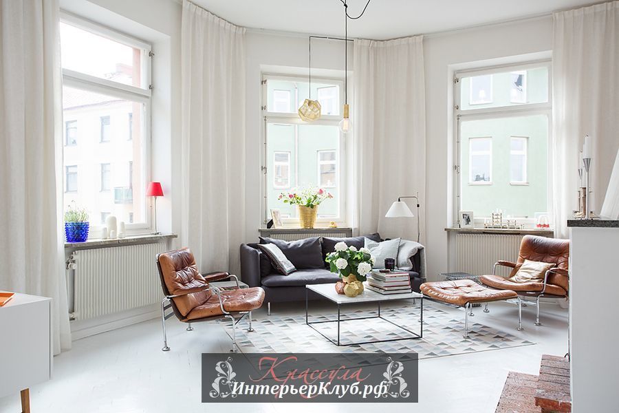 Светлая и свежая гостиная в скандинавской квартире